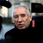 French PM moves to force budget through divided parliament