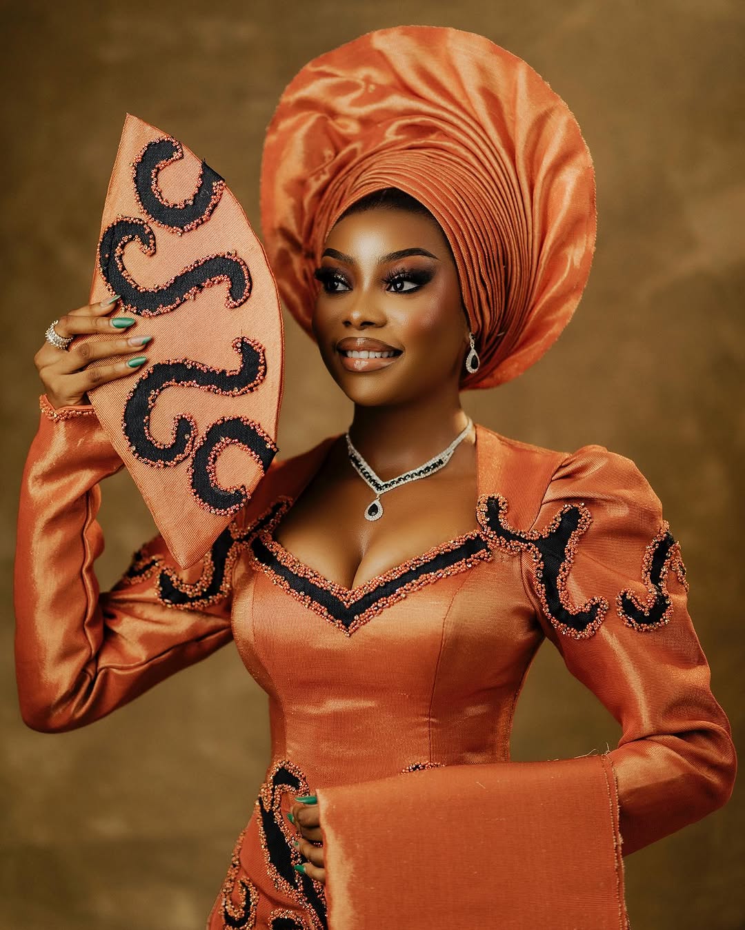 Effortlessly Slay in Peach at Your Yoruba Trad With This Inspo