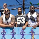 Saints players ride in the Krewe of Tucks