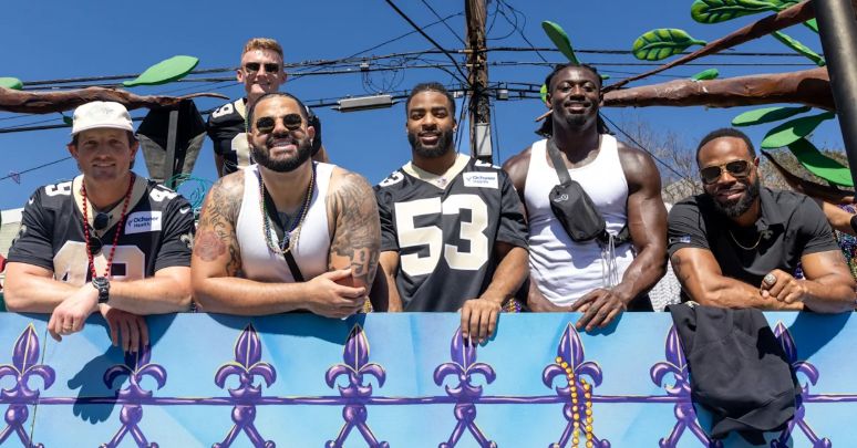 Saints players ride in the Krewe of Tucks
